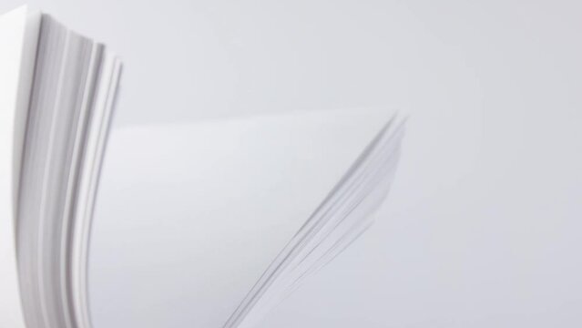 White sheets of paper.Stationery paper. Folded packing sheets.Office stationery. Paper for printing, drawing, writing.