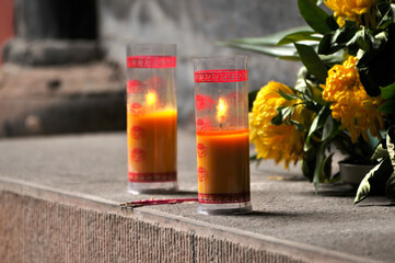 red candles in temple 