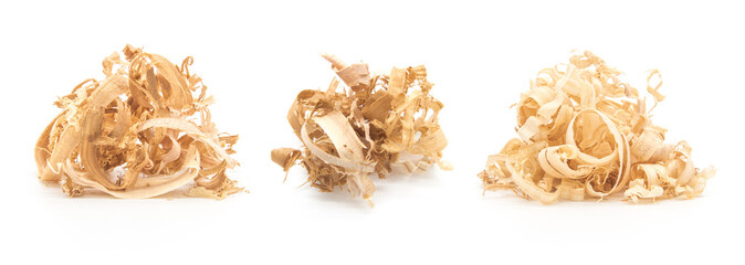 Group of stacked wood shavings closeup isolated on white background