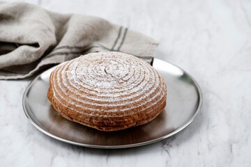 Boule Round Fresh Rustic Bread on Silver Plate,