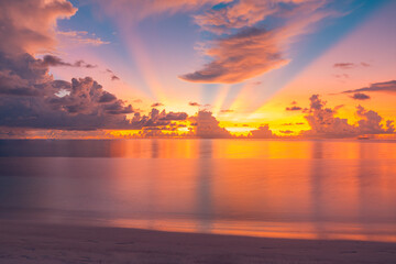 Beautiful sunset sea ocean. Vibrant and soft colors, magic light. Fantastic clouds sky, reflection on water. Concept of romantic time on vacation in tropical. Positive energy, meditation inspiration