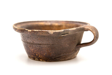 Old used baking dish isolated on white background.