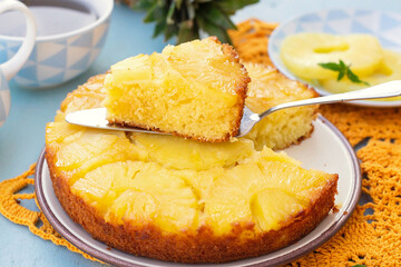 Sweet upside-down cake with pineapples and caramel - 520146692