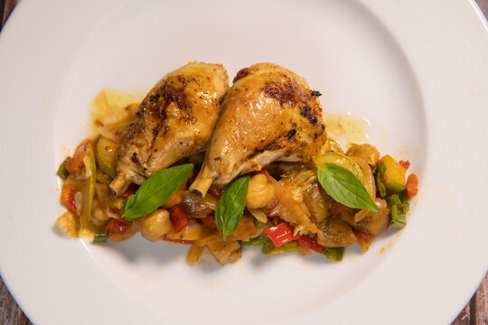 Recipe for grilled basquaise chicken with vegetables in ratatouille. High quality photo