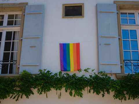 Pride Flag Flies On The Stoop Of Basel House