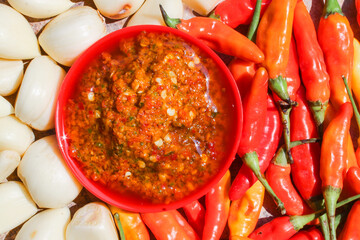 Indonesian garlic chilli sambal or sambel bawang with garlic, chilli and salt as Ingredients. authentic traditional sambal or chilli paste from indonesia.