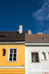 Adjoined old houses facade detail