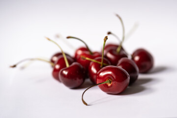 Obraz na płótnie Canvas Close-up sweet cherries with stems