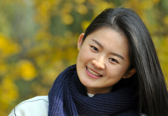 Chinese girl is playing at park