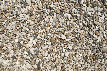 Small multi-colored stones as background. Abstract natural texture.