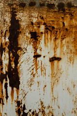 Rusty painted metal background with rust stains. Abstract background with cracked paint for your vintage grunge design