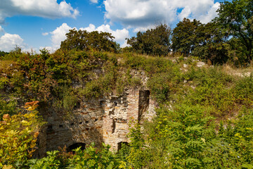 Fototapeta na wymiar Ruined medieval Terebovlia castle outdoor, ancient historical fortress. Terebovlia town.Western Ukraine.