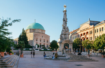 Szechenyi Square and the mosque pasha Qasim  in Pecs, Hungary - 520174236
