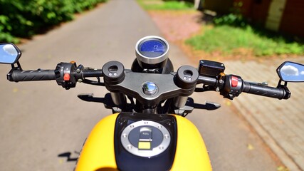 Handlebars and speedometer of motorbike