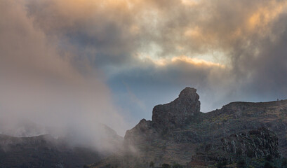Wild volcanic mountain ridge against overcast sky on the isle of La Gomera, Spain