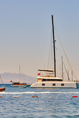 View of boats and yachts in the Aegean Sea from the Bodrum embankment, Turkey.
