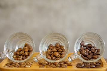 coffee beans ,Light Roast,Medium Roast, Dark Roast, arranged in a gradient
