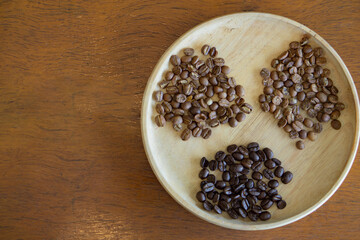 coffee beans ,Light Roast,Medium Roast, Dark Roast, arranged in a gradient