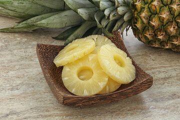 Marinated pineapple rings in the bowl