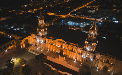 Aerial drone view of Arequipa main square and cathedral church at night. Arequipa, Peru.