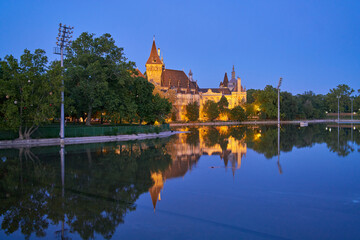 Fototapeta premium Vajdahunyad castle at sunset, Varosliget city park, Budapest, Hungary