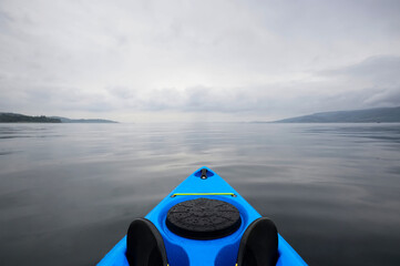 Blue kayak on open water at Firth of Clyde