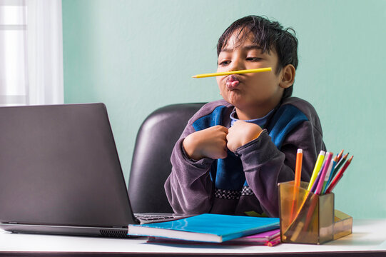 Boy With Pencil Under His Nose