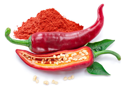 Fresh red chilli pepper and cross section of chilli pepper with seeds isolated on white background.