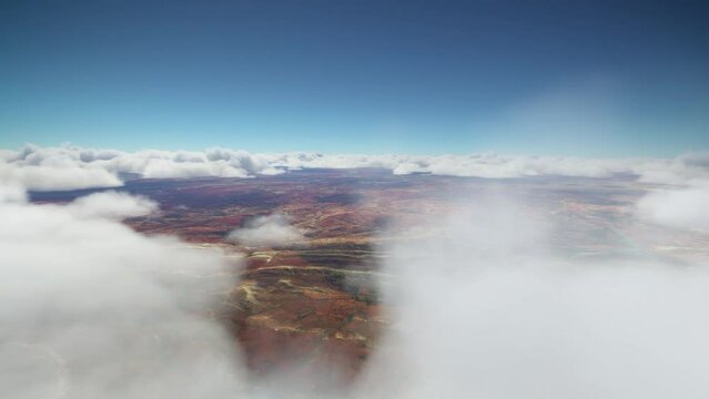 Flying through the clouds of Iytwelepenty, Davenport Ranges National Park. Northern Territory. Australia