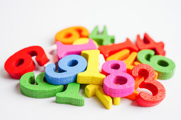 Number wood block cubes for learning Mathematic, education math concept.