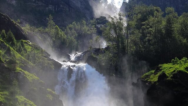 Latefossen Waterfall Odda Norway. Latefoss is a powerful, twin waterfall.