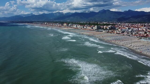 Aerial panning shot of the beach at  Viareggio on the versilian coast of Italy.