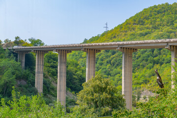 Fototapeta na wymiar automobile bridge between mountains in Georgia