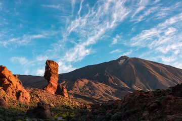 Scenic golden hour sunrise morning view on unique rock formation Roque Cinchado, Roques de Garcia,...