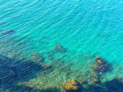 Blue sea water rippled surface.