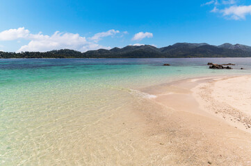 Beautiful Andaman sea, White sand beach and Tropical Turquoise clear blue sea and blue sky background at Lipe Island, Satun, Thailand -  summer  vacation travel