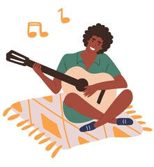A young man is sitting on a blanket and playing the guitar. The guy smiles sings songs and plucks the strings with his legs folded . Flat illustration isolated on a white background