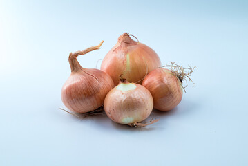 Organic onions on white background