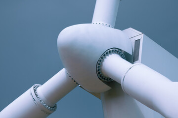 Green energy concept - closeup of a wind turbine