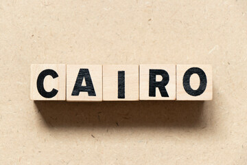 Alphabet letter block in word cairo on wood background