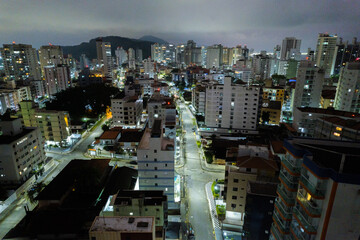 Guarujá city at night. View of Praia do Tombo and Praia das Asturias. Beaches on the coast of...