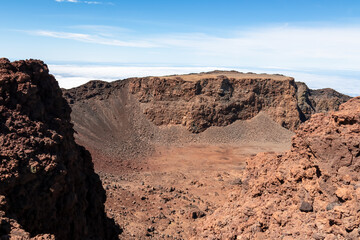Panoramic view from the summit of Pico Viejo into the active crater. Volcanic barren desert terrain...