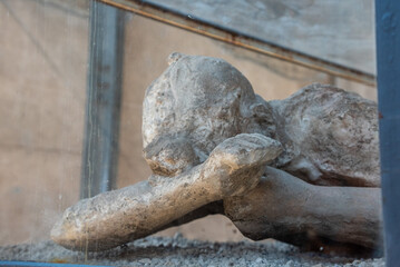 POMPEII, ITALY - MAY 04, 2022 - Pompeiian inhabitants petrified in their last situation of life,...