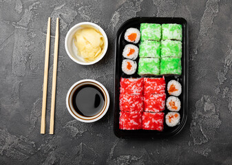 Assorted sushi. Big set of sushi. A variety of Japanese sushi with crab, salmon, eel and caviar on a black marble table. Top viewCopy space. food delivery