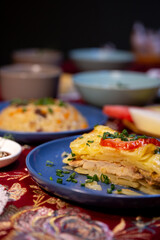 french casserole with chicken on a plate close-up