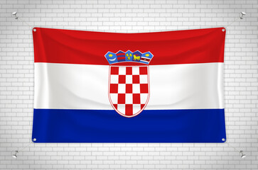 Croatia flag hanging on brick wall. 3D drawing. Flag attached to the wall. Neatly drawing in groups on separate layers for easy editing.