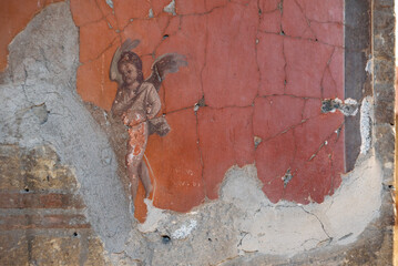HERCULANEUM, ITALY - MAY 05, 2022 - Ornate wall painting in an ancient house in Herculaneum