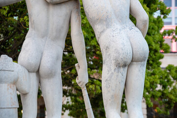 Obraz premium Close view of the butts of two ancient Roman young male sculptures, Naples