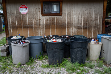 garbage bins behind a bar