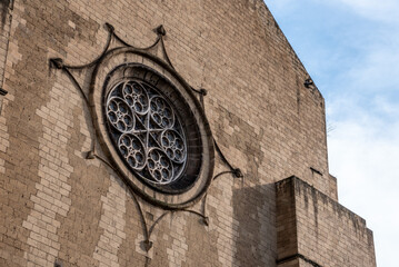 Gothic rosette at the facade of an old mediaeval church in the Spanish Quarter of Naples